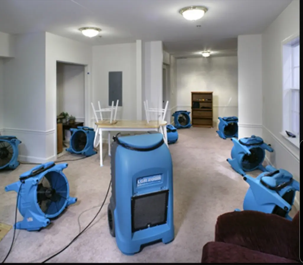Air movers and dehumidifier setup for Water Damage Restoration in Kasson